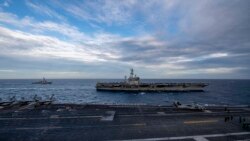美军罗斯福号航母(USS Theodore Roosevelt) 与尼米兹号(USS Nimitz)航母2021年2月9日在南中国海举行双航母联演（美国海军照片）