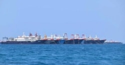 Some of the 220 Chinese vessels are seen moored at Whitsun Reef, South China Sea, March 7, 2021. (Credit: Philippine Coast Guard/National Task Force-West Philippine Sea/Handout)