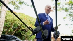 美国总统拜登2022年11月16日在印尼巴厘岛见媒体评论波兰遭导弹袭击事件。（路透社）