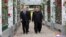FILE - Russia's President Vladimir Putin and North Korea's leader Kim Jong Un walk in the garden of the Kumsusan Guesthouse in Pyongyang, North Korea in this image released by the Korean Central News Agency, June 20, 2024. (KCNA via Reuters)