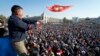 FILE - Large crowds gathered in Bishkek, Kyrgyzstan's capital, to protest the results of a parliamentary election, which gave the majority of seats to parties with ties to the ruling elites amid allegations of vote buying, Oct. 5, 2020.