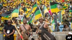 Zulu warriors and African National Congress supporters gather at the Mose Mabhida stadium in Durban, South Africa, Feb. 24, 2024, for their national manifesto launch in anticipation of the 2024 general elections.