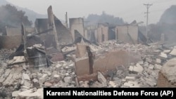 Destroyed concrete structures are scattered in Nam Nein village, Pinlaung township in Shan state, Myanmar, March 12, 2023. Myanmar's military government has denied reports of a new mass killing of civilians by its troops.