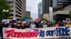 Protesters rally at Legislative Plaza near the Tennessee State Capitol building to urge Governor Bill Lee to veto proposed anti-immigration bills in Nashville, Tennessee, April 4, 2024.