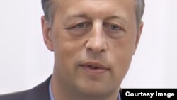 Konstantin Sonin, University of Chicago