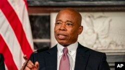 FILE - New York City Mayor Eric Adams speaks during a news conference, Dec. 12, 2023, in New York.
