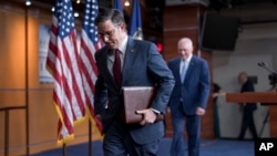 U.S. House Speaker Mike Johnson departs after he and the House Republican leadership met with reporters following a closed-door Republican strategy session on aid for Ukraine, Israel and other allies, at the Capitol in Washington, April 16, 2024. 