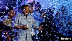 Reaksi calon presiden Prabowo Subianto usai penghitungan suara tidak resmi dalam acara peninjauan hasil pemilu di Jakarta, 14 Februari 2024. (Foto: REUTERS/Kim Kyung-Hoon)