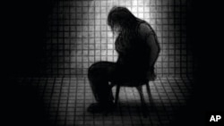 An illustration of Viktoriia Andrusha, a Ukrainian elementary school math teacher, being held in a room where she was threatened with torture by Russian soldiers.