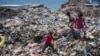 Palestinians face summer heat surrounded by sewage, garbage