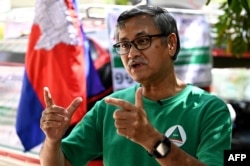 In this photo taken on July 4, 2023, Yeng Virak, president of Cambodia's Grassroots Democratic Party (GDP) speaks during an interview at his home in Phnom Penh.