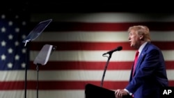 FILE - Mantan Presiden Donald Trump berbicara dalam rapat umum di Reno, Nevada, 17 Desember 2023. (AP/Godofredo A. Vásquez)