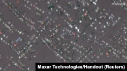 In Photos: Ukrainians Flee Flood Following Destruction of Kakhovka Dam