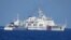 FILE - A Chinese Coast Guard ship allegedly obstructs a Philippine Coast Guard vessel as it provided support during a Philippine Navy operation in the disputed South China Sea, June 30, 2023 in this handout image released July 5, 2023.
