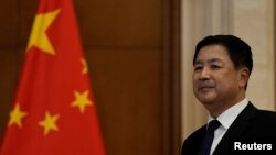 FILE - Menteri Keamanan Publik China Wang Xiaohong di Diaoyutai State Guesthouse, Beijing, 30 Januari 2024. (Ng Han Guan/pool via REUTERS)