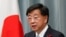FILE - Chief Cabinet Secretary Hirokazu Matsuno in Tokyo, Japan, Oct. 4, 2021. 