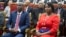 FILE - Haitian President Jovenel Moise, left, sits with his wife Martine during his swearing-in ceremony at Parliament in Port-au-Prince, Haiti, Feb. 7, 2017. Jovenel Moise was killed on July 7, 2021.