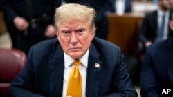 Former President Donald Trump attends his trial at Manhattan Criminal Court in New York, May 29, 2024. 