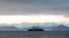 FILE - The Canadian Coast Guard ship Des Groseilliers is seen near the arctic community of Pond Inlet, Nunavut, Aug. 23, 2014.