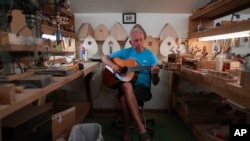 Mike Dulak, a mandolin maker from Rocheport, Missouri, is one of a growing number of Americans who say they don't associate themselves with any religion. Photo taken Sept. 8, 2023.