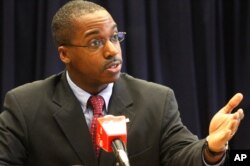 FILE - Reuben Brigety, then the U.S. Deputy Assistant Secretary of State, speaks to journalists in Nairobi, Kenya, March 30, 2010.