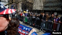 Anti-Trump protesters face Trump supporters outside the Manhattan Criminal Courthouse in New York, April 4, 2023.
