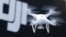 FILE - A Phantom 4, developed by Chinese consumer drone maker DJI, is pictured during a demonstration flight in Tokyo, March 3, 2016. Washington, Beijing and Taipei are working to improve the sophistication, adaptability and cost of drone technology.