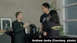 Mickey Bergman speaks with professional American basketball player Brittney Griner following her release from a Russian prison. Phoenix, Arizona, 2023. (Photo by Andrew Jenks, courtesy of Mickey Bergman)