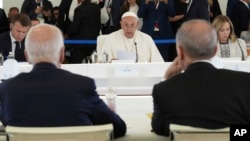 Pope Francis speaks during a working session on artificial intelligence), energy and the Africa-Mediterranean region at the G7 summit at Borgo Egnazia, Italy, June 14, 2024.