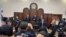 Judge Yelubay Abibullayev delivers the verdict on the criminal cases of 22 Karakalpaks, in Bukhara, Uzbekistan, Jan. 31, 2023. (Uzbekistan's Ombudsman)