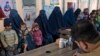 Afghan women and children refugees deported from Pakistan wait in a nutrition ward at the United Nations High Commissioner for Refugees camp on the outskirts of Kabul, Afghanistan, Jan. 9, 2024.