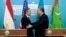 United States Secretary of State Antony Blinken, left, and Kazakhstan's Foreign Minister Mukhtar Tileuberdi greet each other at the end of a joint press conference at the Ministry of Foreign Affairs, in Astana, Kazakhstan, Feb. 28, 2023. 