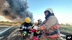 Ma’aikatan Agaji Na Tonan Wadanda Suka Makale A Baraguzo, Ukraine