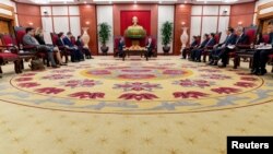 FILE - Secretary of State Antony Blinken, center left, meets with Vietnam's Communist Party General Secretary Nguyen Phu Trong, center right, in Hanoi, Apr. 15, 2023. Blinken has expressed hope that US-Vietnam ties could be strengthened. (Andrew Harnik/Pool via Reuters)
