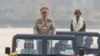 Jenderal Senior Min Aung Hlaing, kiri, Kepala Dewan Militer, menginspeksi petugas saat parade memperingati Hari Angkatan Bersenjata Myanmar ke-78 di Naypyitaw, Myanmar, Senin, 27 Maret 2023. (Foto: AP)