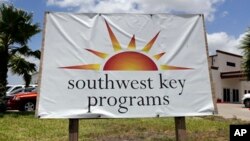 FILE - A Southwest Key sign is displayed June 20, 2014, in Brownsville, Texas. Southwest Key, a housing provider for unaccompanied migrant children, has been accused of sexually abusing and harassing them, the Justice Department said July 18, 2024.