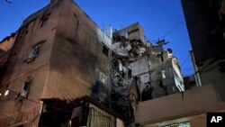This building was hit by an Israeli airstrike in the southern suburbs of Beirut, Lebanon, July 30, 2024. An Israeli airstrike hit Hezbollah's stronghold south of Beirut Tuesday evening causing damage, a Hezbollah official and the group's TV station said. 