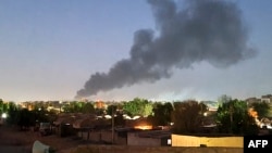 Smoke billows in Khartoum amid ongoing fighting between the forces of two rival generals in Sudan on May 6, 2023.