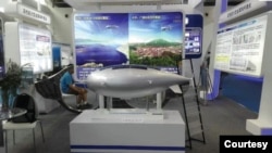 FILE - A model of a flying object which analysts say was part of China’s near space research and development was featured at what appears to be an aeronautical/aerospace exhibition in China in 2015. (Courtesy Rick Fisher, International Assessment and Strategy Center)