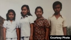 Reasey Poch with his mother and two sisters at the Cambodian refugee camp in Song Be, Vietnam in 1981.
