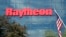 FILE - An American flag flies in front of the facade of Raytheon's Integrated Defense Systems facility in Woburn, Massachusetts, June 10, 2019. Three of the company's subsidiaries were announced on Jan. 2, 2025, as being among those sanctioned by China.
