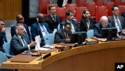 Ukrainian Ambassador to the United Nations Sergiy Kyslytsya, left, shuffles papers as he listens to Vassily Nebenzia, Permanent Representative of Russia to the United Nations, Oct. 9, 2023, at United Nations headquarters.