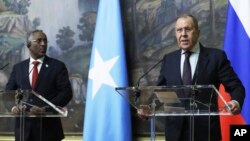 Russian Foreign Minister Sergey Lavrov, right, and Somali Foreign Minister Abshir Omar Jama attend a joint press conference following their talks in Moscow, May 26, 2023. 
