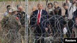 Republican presidential candidate and former U.S. President Donald Trump visits the U.S.-Mexico border in Eagle Pass, a city in the U.S. state of Texas, as seen from Piedras Negras, Mexico, Feb. 29, 2024. The same day, U.S. President Joe Biden visited another border city.
