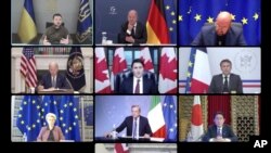 2022年10月11日，七大工业国组织(G7)领导人同乌克兰总统泽连斯基举行视频会议，乌克兰总统泽连斯基（左上角）与日本首相岸田文雄（右下角）同框出现视频银幕上。