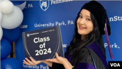 FILE - Shakhrizoda Mamasolieva is among this year's 47 Uzbek LLM graduates at Penn State Law, State College, Pennsylvania, May 10, 2024.