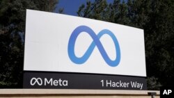 FILE - Meta's logo is seen at the tech giant's headquarters in Menlo Park, California, Oct. 28, 2021.
