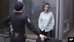 FILE - Alsu Kurmasheva attends a court hearing during her imprisonment in Kazan, Russia, April 1, 2024.