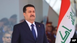 资料照片：2024年1月9日，伊拉克总理苏达尼在巴格达。（美联社照片）