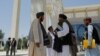 FILE - Taliban members are seen at Kabul University in Kabul, Afghanistan, June 14, 2023.